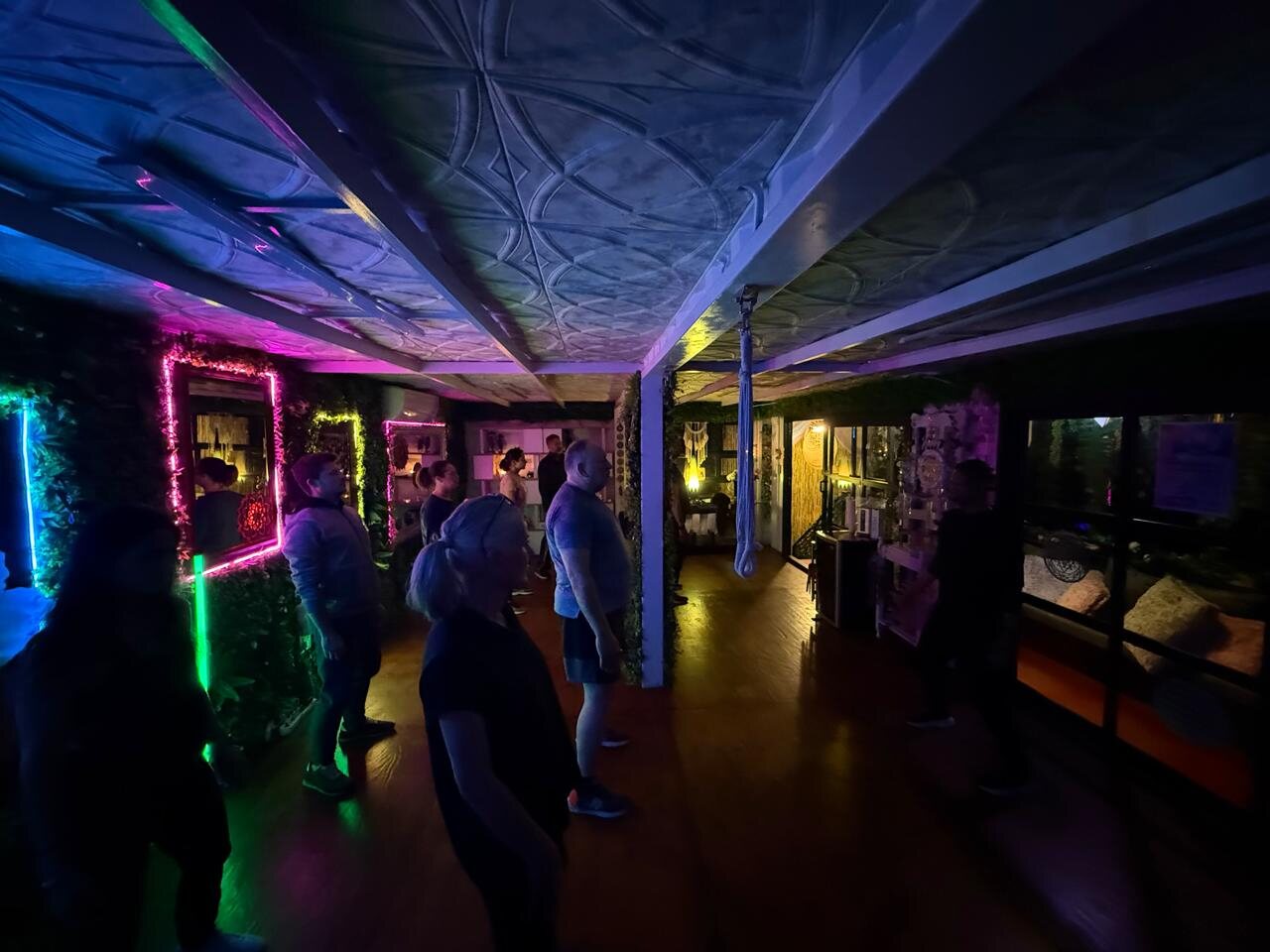 The HappiSpace studio at night, lit for sound healing and moon yoga, Fairmount